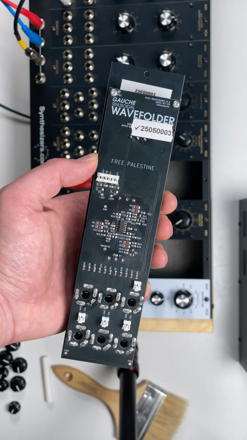 G515 Module in hand, back (component) view